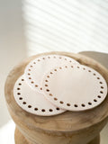 Bases de madera con agujeros